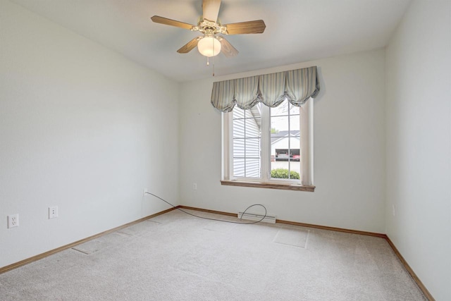 3205 N Mistwood Ln, Appleton, WI 54914 - empty room with light colored carpet, ceiling fan, and baseboards