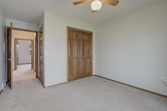 3205 N Mistwood Ln, Appleton, WI 54914 - unfurnished bedroom featuring light carpet, a closet, baseboards, and ceiling fan