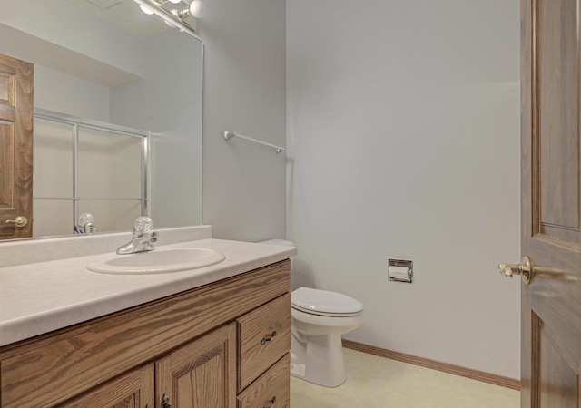 3205 N Mistwood Ln, Appleton, WI 54914 - bathroom featuring vanity, toilet, and a shower with shower door