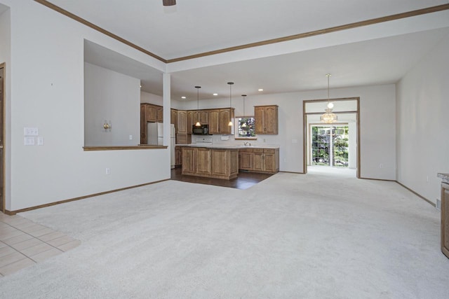 3205 N Mistwood Ln, Appleton, WI 54914 - kitchen featuring freestanding refrigerator, carpet, recessed lighting, open floor plan, and a center island