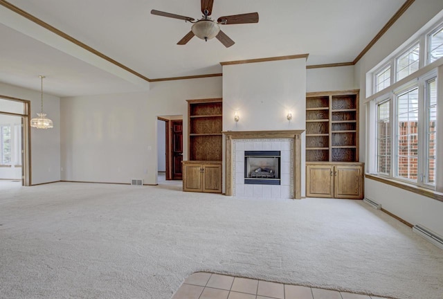 3205 N Mistwood Ln, Appleton, WI 54914 - unfurnished living room with carpet floors, baseboards, a fireplace, a chandelier, and ceiling fan