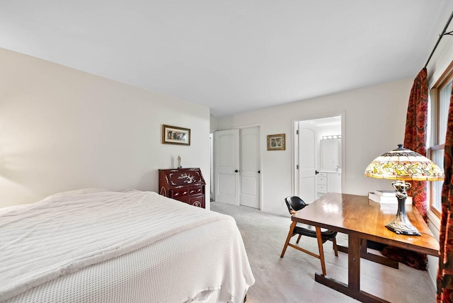 483 W S St Unit A, Lake Geneva, WI 53147 - bedroom featuring light carpet and connected bathroom