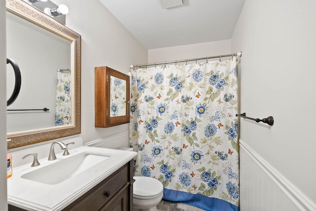483 W S St Unit A, Lake Geneva, WI 53147 - full bathroom featuring vanity, toilet, and a shower with shower curtain