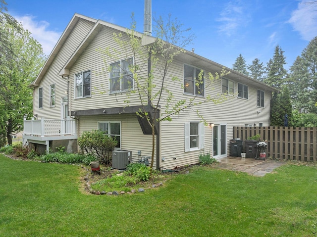 483 W S St Unit A, Lake Geneva, WI 53147 - back of house with central AC and a patio