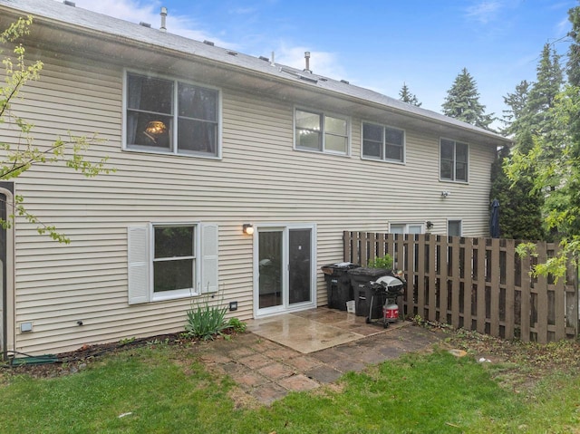 483 W S St Unit A, Lake Geneva, WI 53147 - rear view of property with a patio