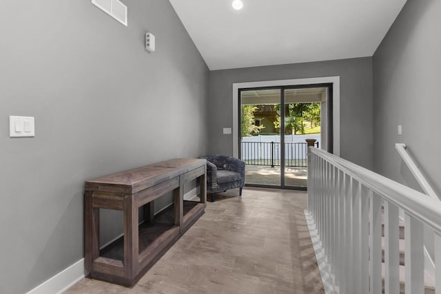 9435 402nd Ave, Genoa City, WI 53128 - hallway with vaulted ceiling and baseboards