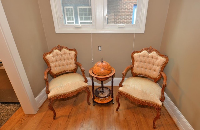 3524 Washington Ave, Racine, WI 53402 - living area featuring wood finished floors and baseboards