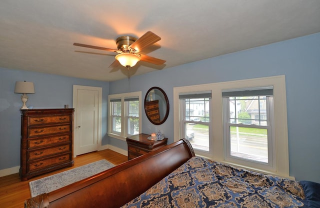 3524 Washington Ave, Racine, WI 53402 - bedroom featuring wood finished floors, baseboards, and ceiling fan