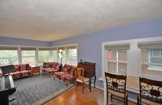 3524 Washington Ave, Racine, WI 53402 - living room featuring wood finished floors and baseboards