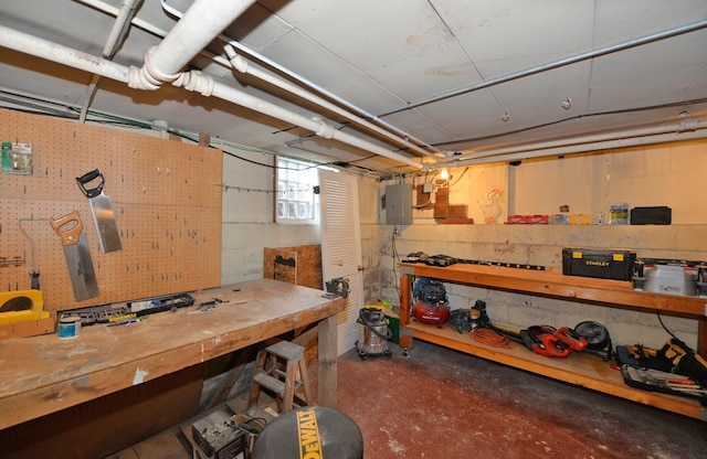 3524 Washington Ave, Racine, WI 53402 - below grade area featuring a workshop area and electric panel