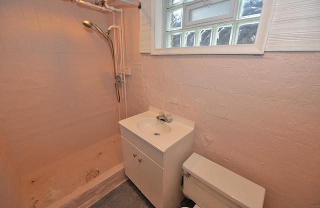 3524 Washington Ave, Racine, WI 53402 - bathroom featuring a shower stall, toilet, and vanity