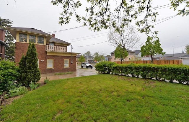 3524 Washington Ave, Racine, WI 53402 - view of green lawn with a residential view and a balcony