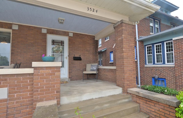 3524 Washington Ave, Racine, WI 53402 - property entrance featuring covered porch and brick siding