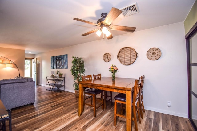 2116 Woodburn Rd Unit B, Waukesha, WI 53188 - dining room with wood finished floors, baseboards, and a ceiling fan