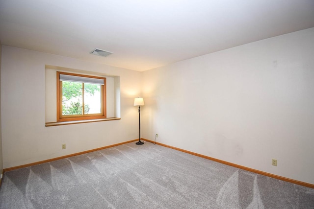 2116 Woodburn Rd Unit B, Waukesha, WI 53188 - empty room with baseboards and carpet floors