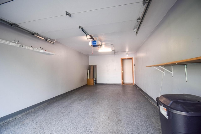 2116 Woodburn Rd Unit B, Waukesha, WI 53188 - garage with baseboards and a garage door opener