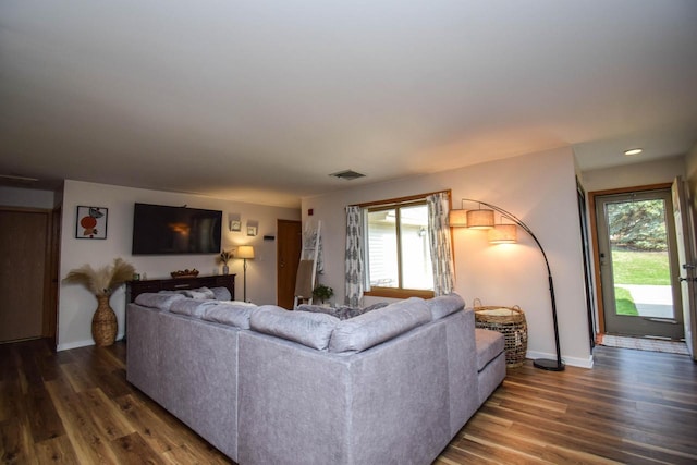 2116 Woodburn Rd Unit B, Waukesha, WI 53188 - living area featuring wood finished floors, baseboards, and recessed lighting