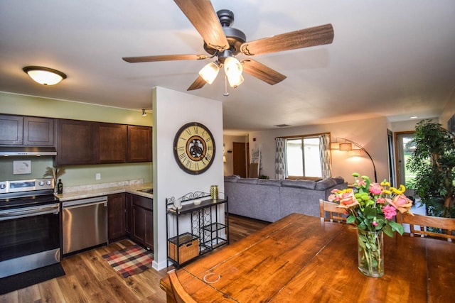 2116 Woodburn Rd Unit B, Waukesha, WI 53188 - dining space featuring dark wood finished floors and ceiling fan