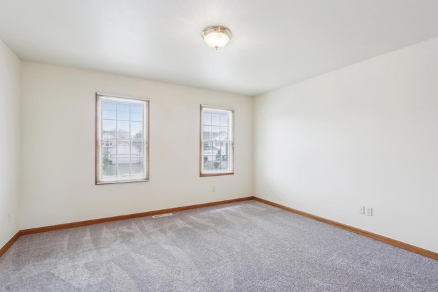 24434 88th St, Salem, WI 53168 - empty room with carpet and baseboards