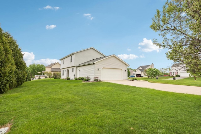 24434 88th St, Salem, WI 53168 - view of home's exterior featuring concrete driveway, a garage, and a lawn