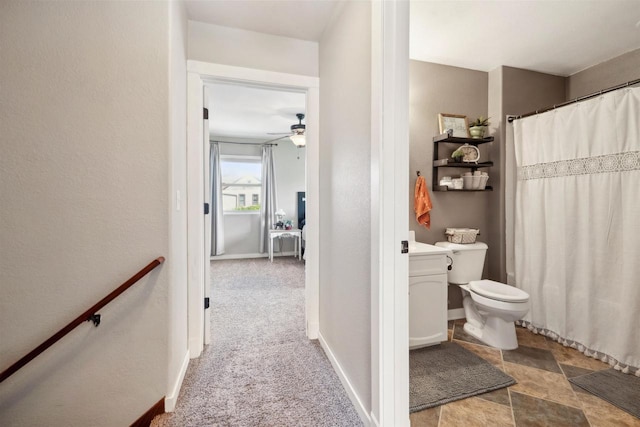 273 5th St, Fond Du Lac, WI 54935 - full bath with toilet, ceiling fan, curtained shower, and baseboards