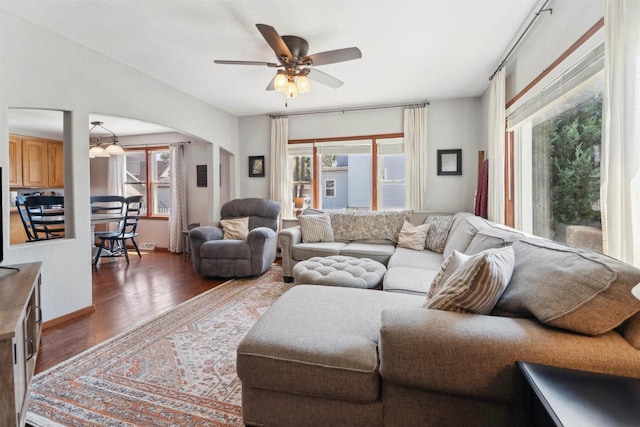 273 5th St, Fond Du Lac, WI 54935 - living room with a ceiling fan, plenty of natural light, and arched walkways
