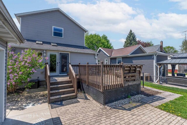 273 5th St, Fond Du Lac, WI 54935 - back of house with a wooden deck, a gazebo, french doors, and a patio