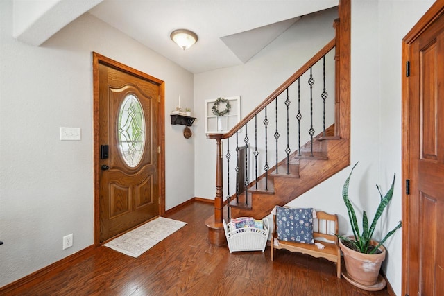 273 5th St, Fond Du Lac, WI 54935 - foyer entrance featuring stairway, wood finished floors, and baseboards