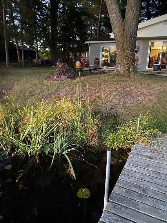 415 S River, Spooner, WI 54801 - view of yard featuring a dock