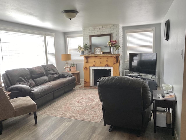 816 Gladstone St, Marinette, WI 54143 - living room featuring wood finished floors and a fireplace