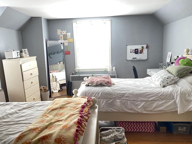 816 Gladstone St, Marinette, WI 54143 - bedroom featuring wood finished floors and lofted ceiling