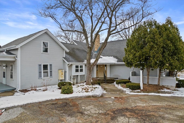 1530 Utah St, Watertown, WI 53094 - view of front of house featuring a chimney and roof with shingles