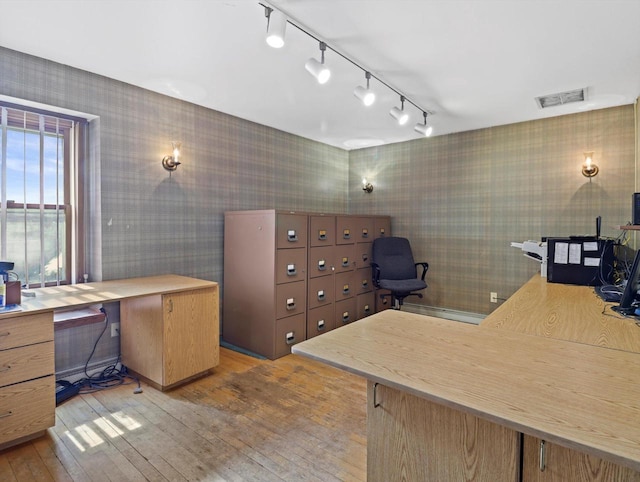 1530 Utah St, Watertown, WI 53094 - office with wallpapered walls, rail lighting, and hardwood / wood-style flooring