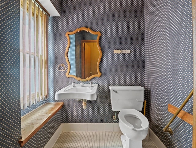 1530 Utah St, Watertown, WI 53094 - half bath with tile patterned floors, toilet, and a sink
