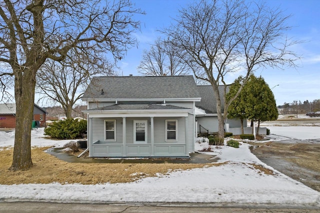 1530 Utah St, Watertown, WI 53094 - view of front of home featuring roof with shingles and covered porch