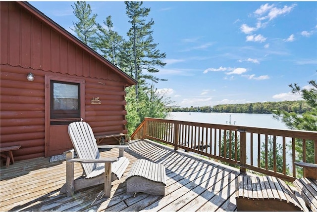 1949 E Little Blake Lake Ln, Luck, WI 54853 - wooden deck featuring a water view