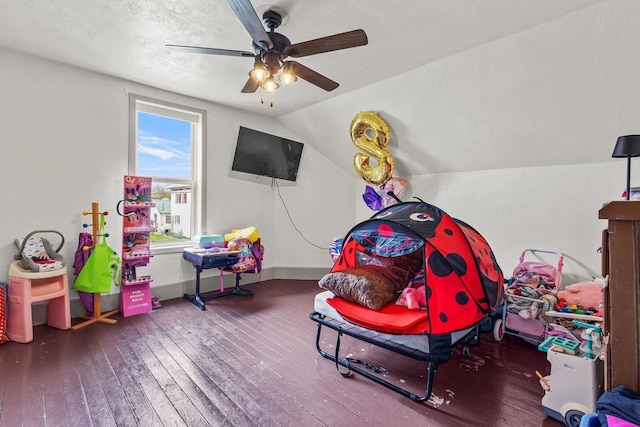 254 Mill St, Algoma, WI 54201 - recreation room with ceiling fan, wood-type flooring, vaulted ceiling, and baseboards