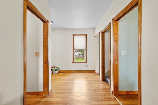 254 Mill St, Algoma, WI 54201 - hallway featuring light wood-style flooring and baseboards