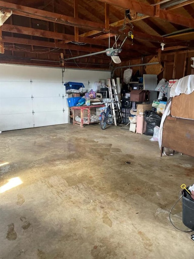 W1796 Puddlefort St, Mount Calvary, WI 53057 - garage featuring a garage door opener
