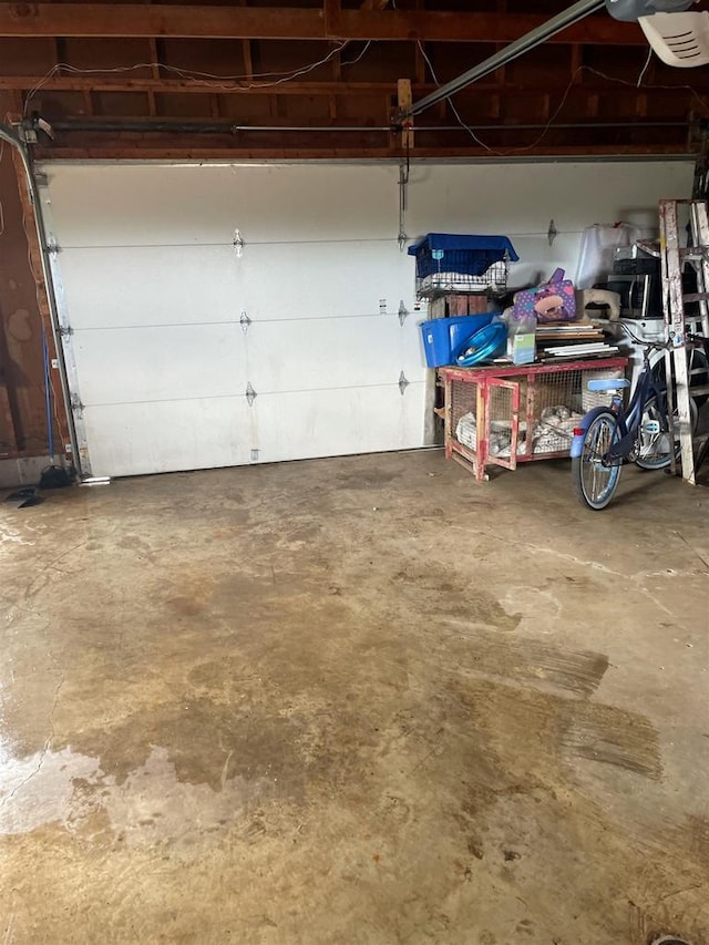 W1796 Puddlefort St, Mount Calvary, WI 53057 - garage featuring a garage door opener