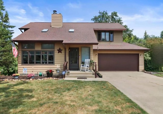 400 Old Indian Trl, Deforest, WI 53532 - view of front of property with a garage, driveway, a chimney, a front yard, and roof with shingles