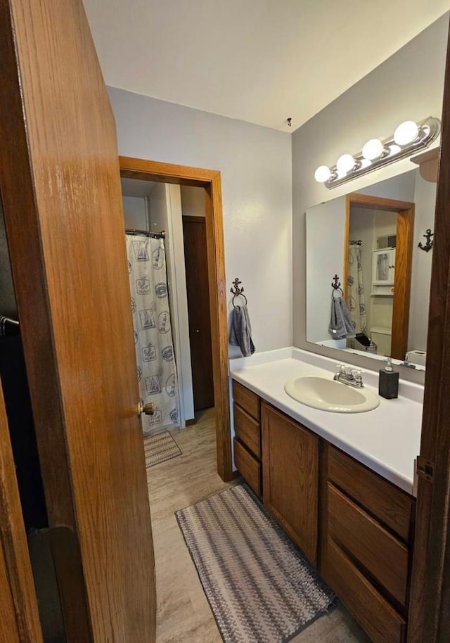 400 Old Indian Trl, Deforest, WI 53532 - bathroom with vanity and wood finished floors