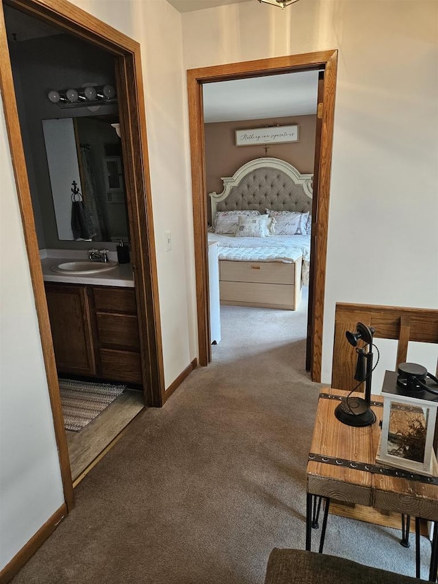 400 Old Indian Trl, Deforest, WI 53532 - hall featuring carpet, a sink, and baseboards
