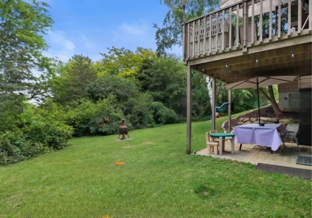 400 Old Indian Trl, Deforest, WI 53532 - view of green lawn with a patio and a wooden deck
