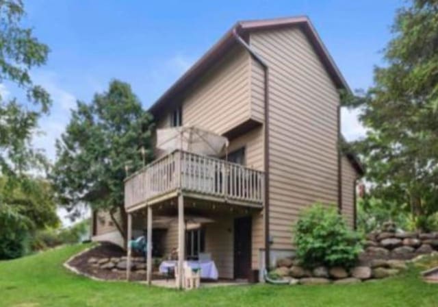 400 Old Indian Trl, Deforest, WI 53532 - back of house featuring a lawn and a deck