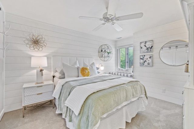 18 Abbey Villas Cir Unit G, Fontana, WI 53125 - carpeted bedroom with wood walls and a ceiling fan