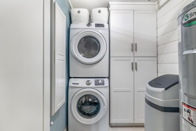 18 Abbey Villas Cir Unit G, Fontana, WI 53125 - laundry room with stacked washer / dryer and cabinet space