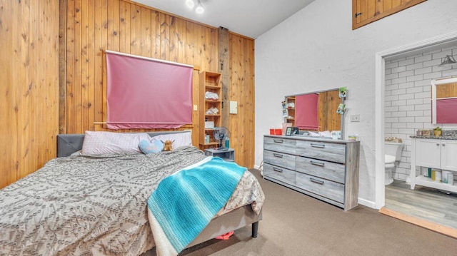 N2289 US Highway 45, Campbellsport, WI 53010 - carpeted bedroom featuring wooden walls and lofted ceiling