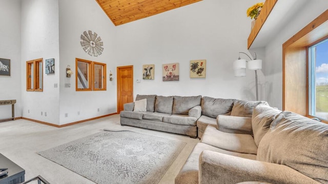 N2289 US Highway 45, Campbellsport, WI 53010 - carpeted living area featuring baseboards, wood ceiling, and high vaulted ceiling