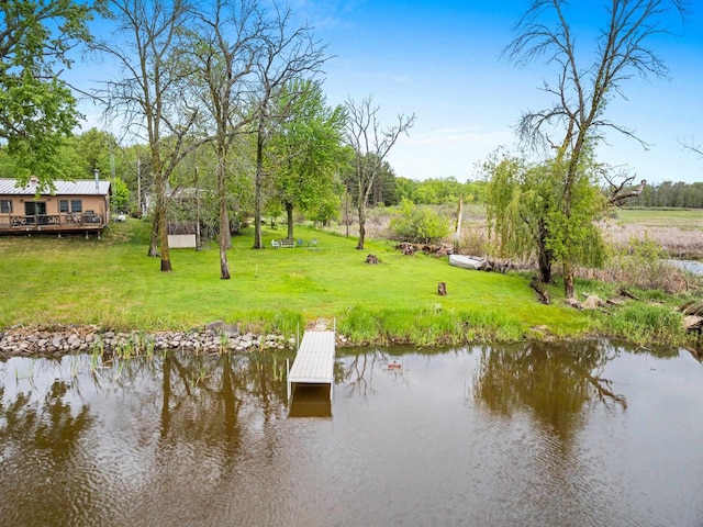 N5101 Lueck Ln, Princeton, WI 54968 - dock area featuring a yard and a water view